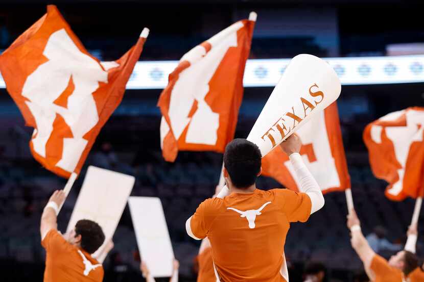 The Texas Longhorns cheerleaders entertain during a second half timeout at the American...