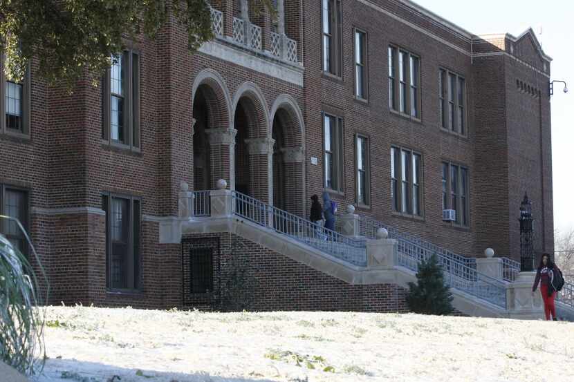 Students walked to class at Sunset High School in the cold weather on Dec. 10, 2013 . 