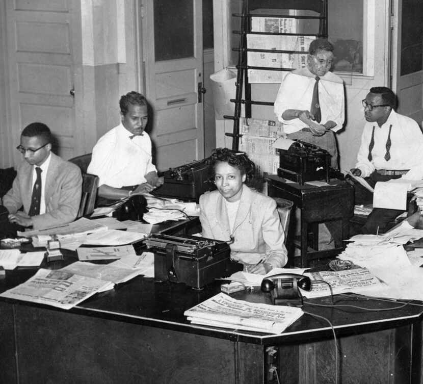 In the center  of this late-’40s photo of the  Defender ’s newsroom is city editor Audrey...