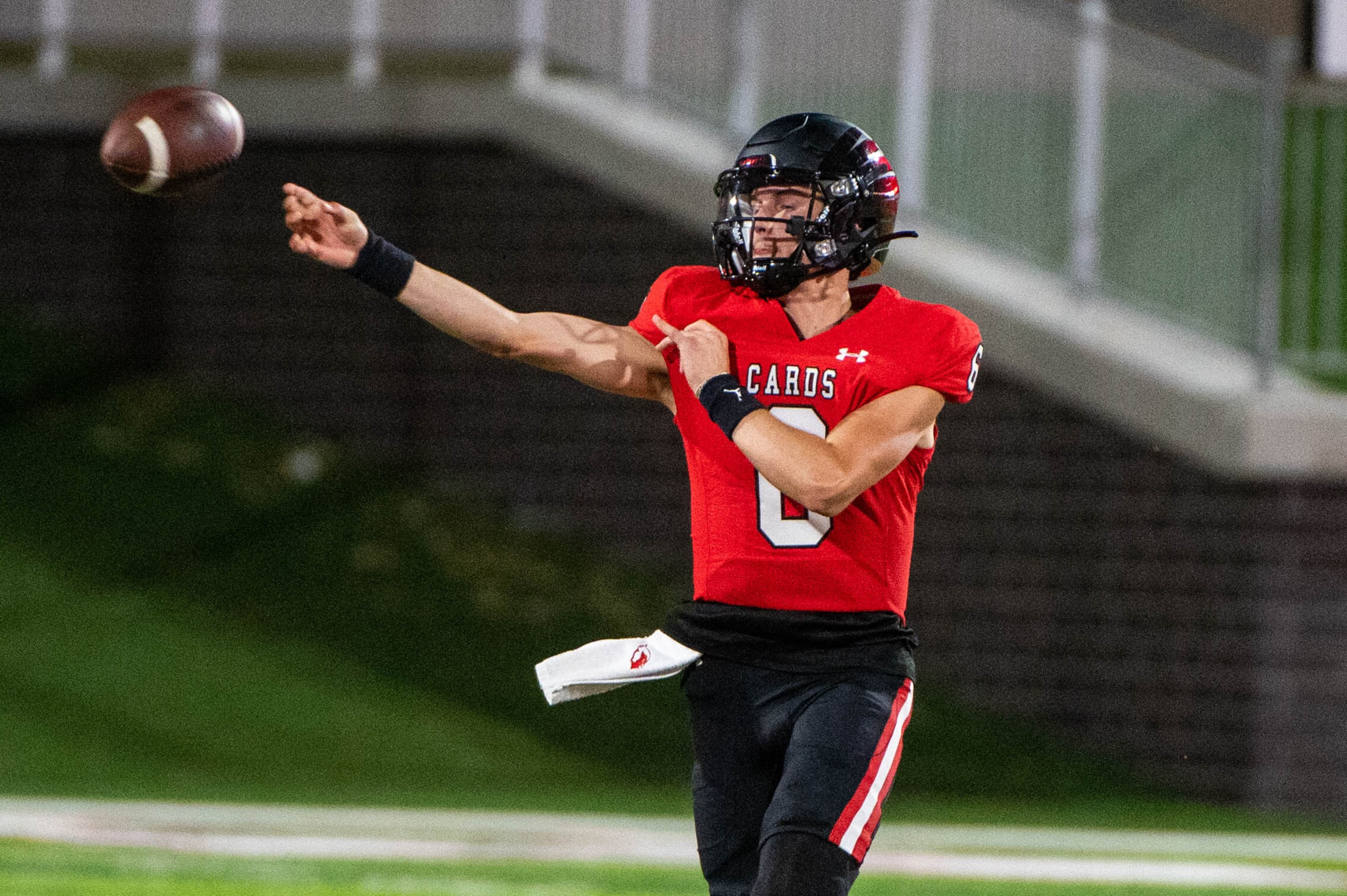 Melissa quarterback Trever Ham (6) throws a pass in the first half during a high school...