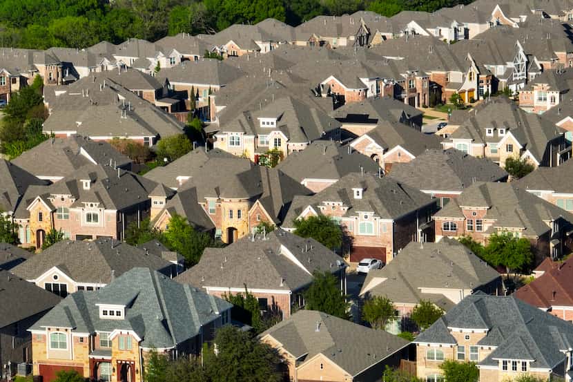 Aerial view of homes in the Harrington Mills subdivision in Plano on Saturday, April 8, 2023.