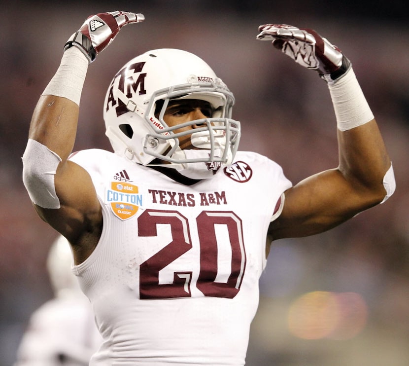 Texas A&M Aggies running back Trey Williams (20) reacts after his touchdown during third...