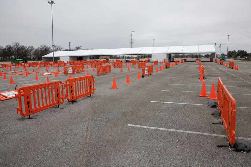 The tent area set up for drive through COVID-19 vaccinations at Fair Park in Dallas on...