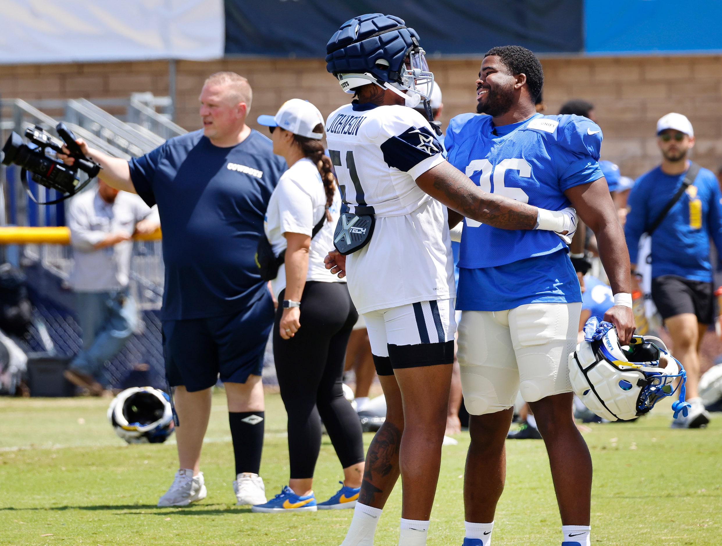 Dallas Cowboys defensive end Durrell Johnson (51) and Los Angeles Rams linebacker Keir...