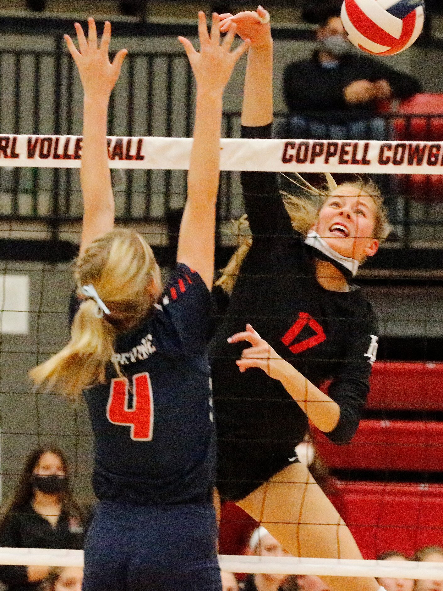 Lovejoy High School setter Rosemary Archer (17) hits past Grapevine High School setter...