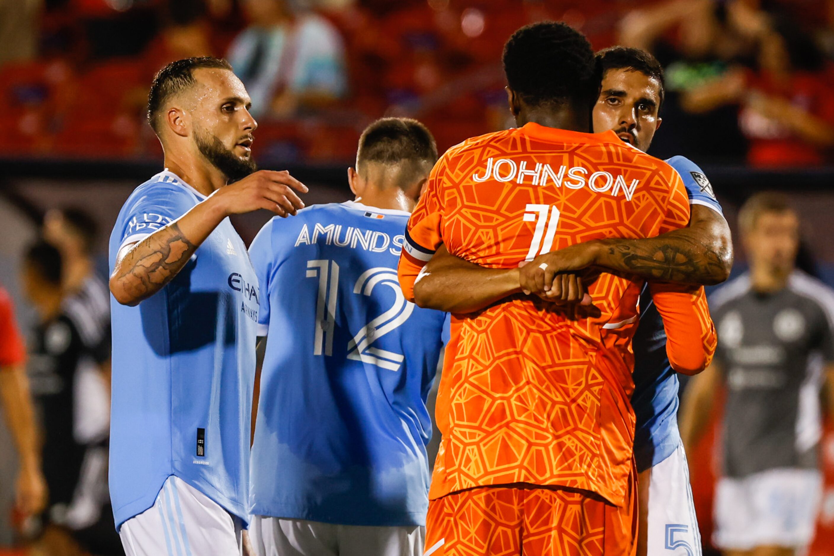 New York City goalkeeper Sean Johnson (1) celebrates with teammates their vector over FC...