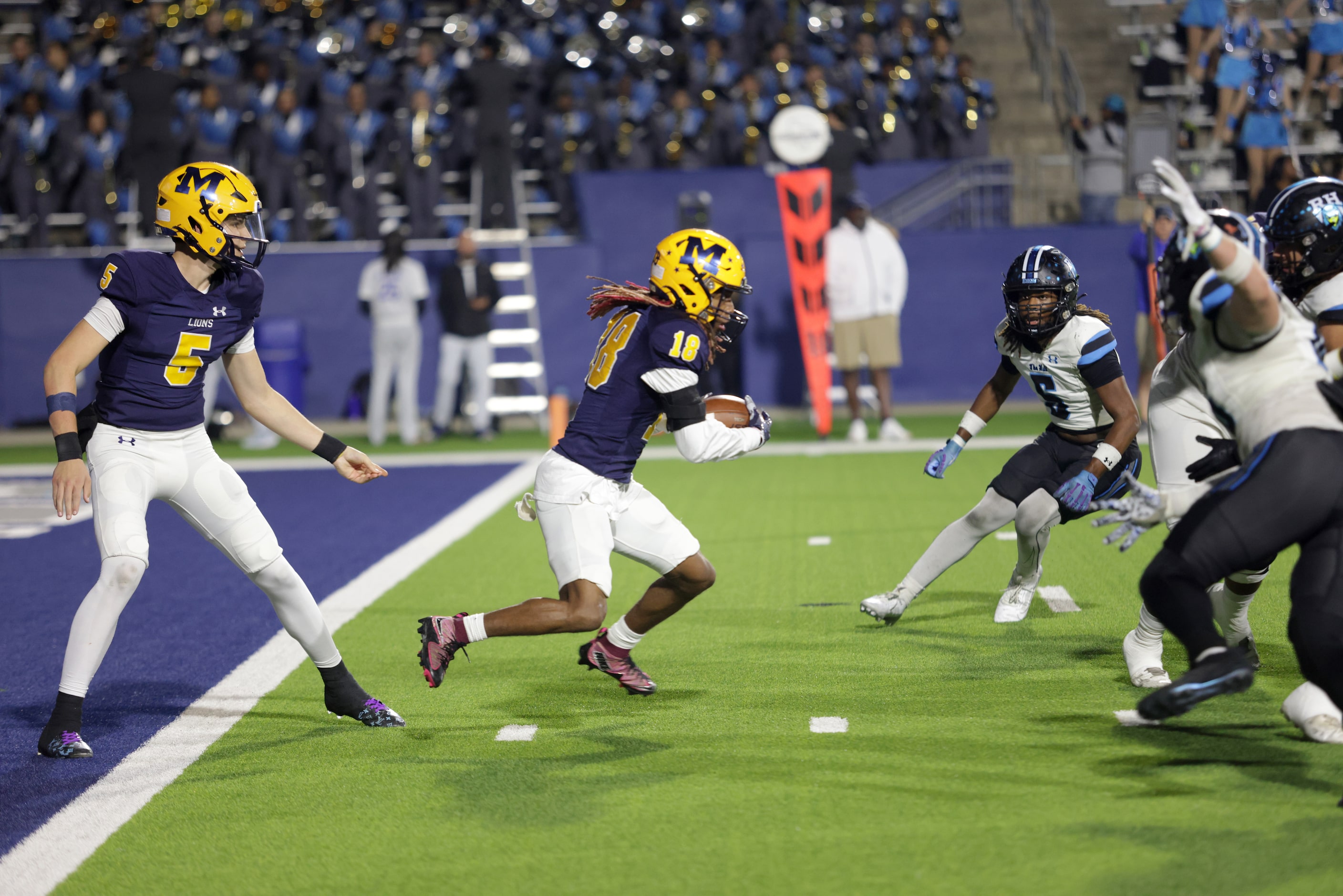 McKinney player #18 Jacoby Propes runs the ball for a 3 yard gain during the Prosper Rock...