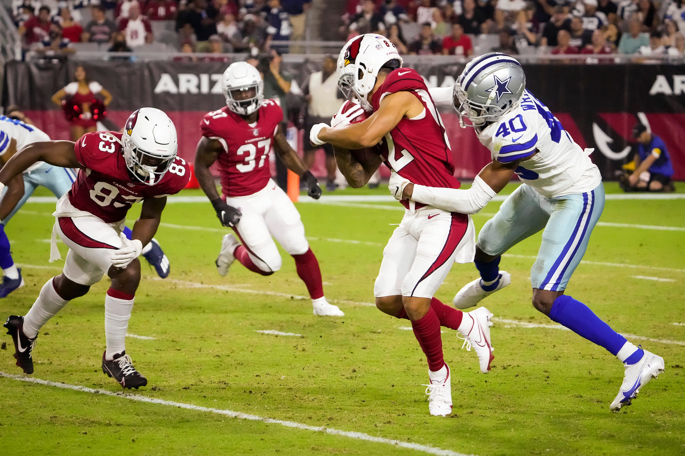 Dallas Cowboys cornerback Nahshon Wright (40) brings down Arizona Cardinals returner Andre...