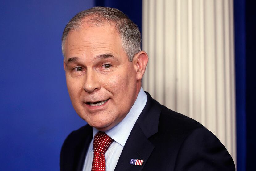 FILE - In this June 2, 2017 file photo, EPA Administrator Scott Pruitt looks back after...