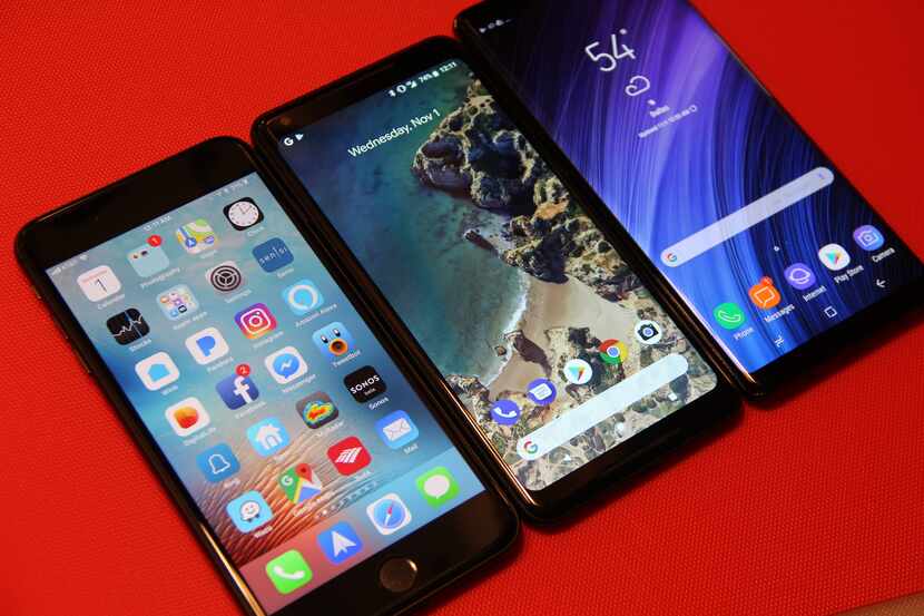 Google's Pixel 2 XL (center) flanked by the iPhone 8 Plus (left) and Samsung's Galaxy Note 8...