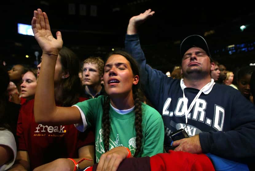 Taylor Burnett, 17, of Canton and Teddy M. Christian, 38, of Lewisville raised their hands...