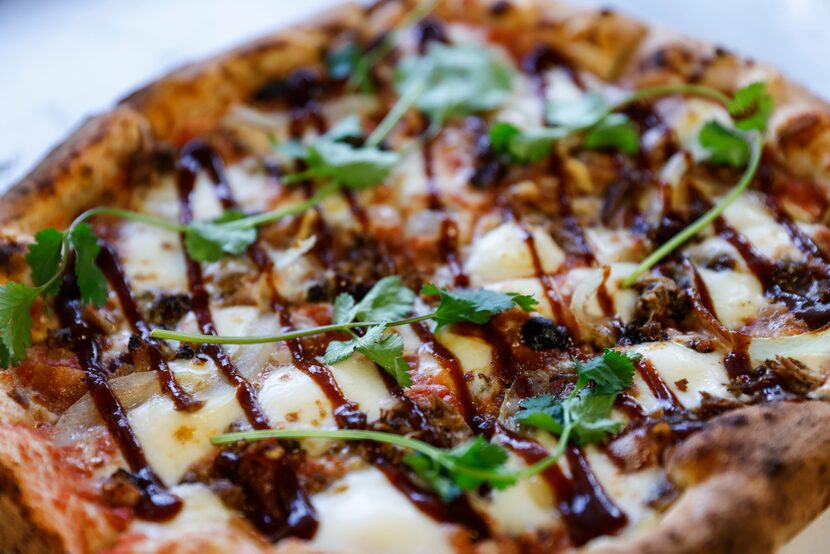 A “horseshoe” pizza is made for a customer at Triple N Ranch Winery.