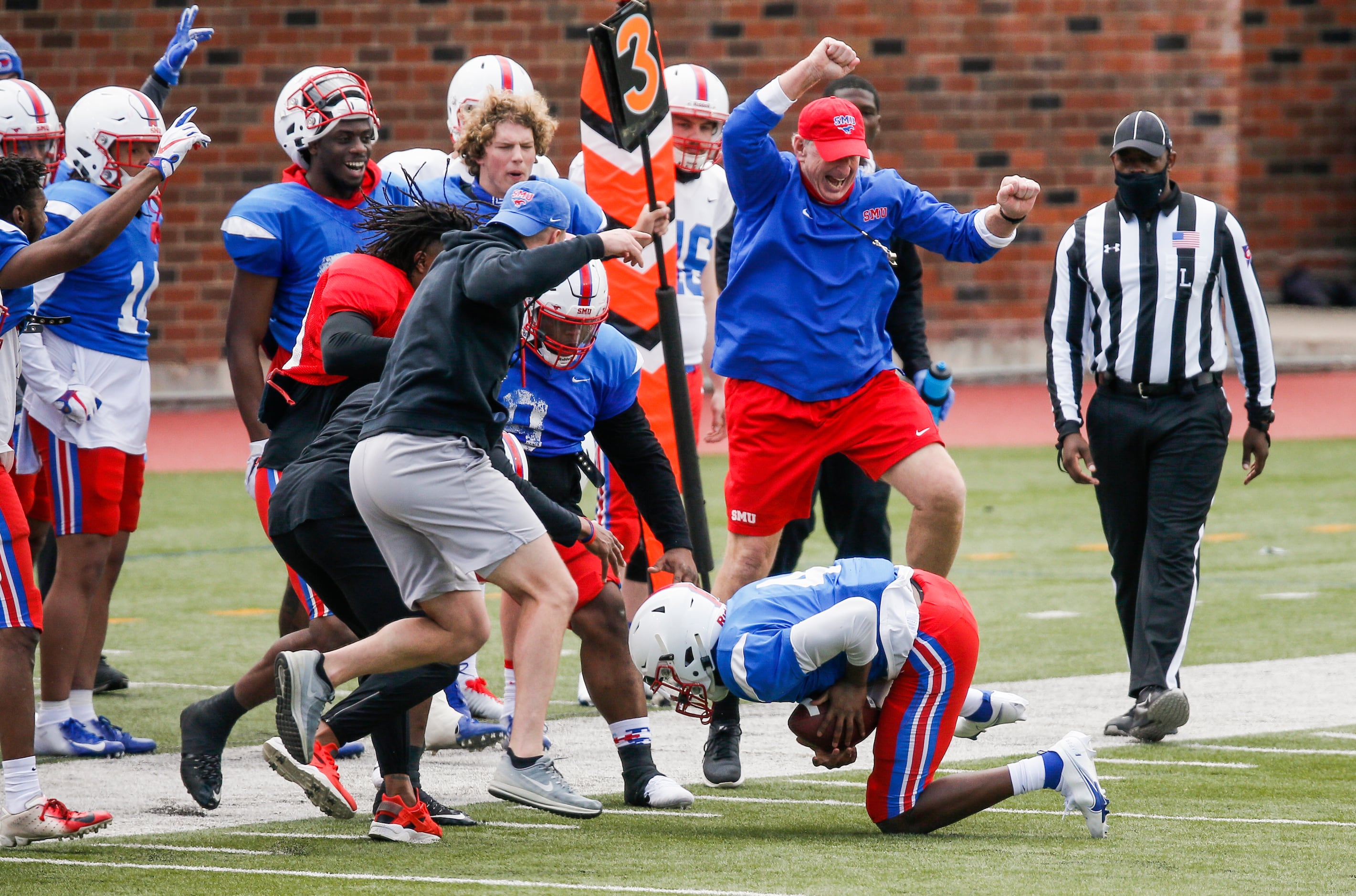 SMU safety Bryce McMorris (4) is congratulated by teammates after intercepting a pass during...