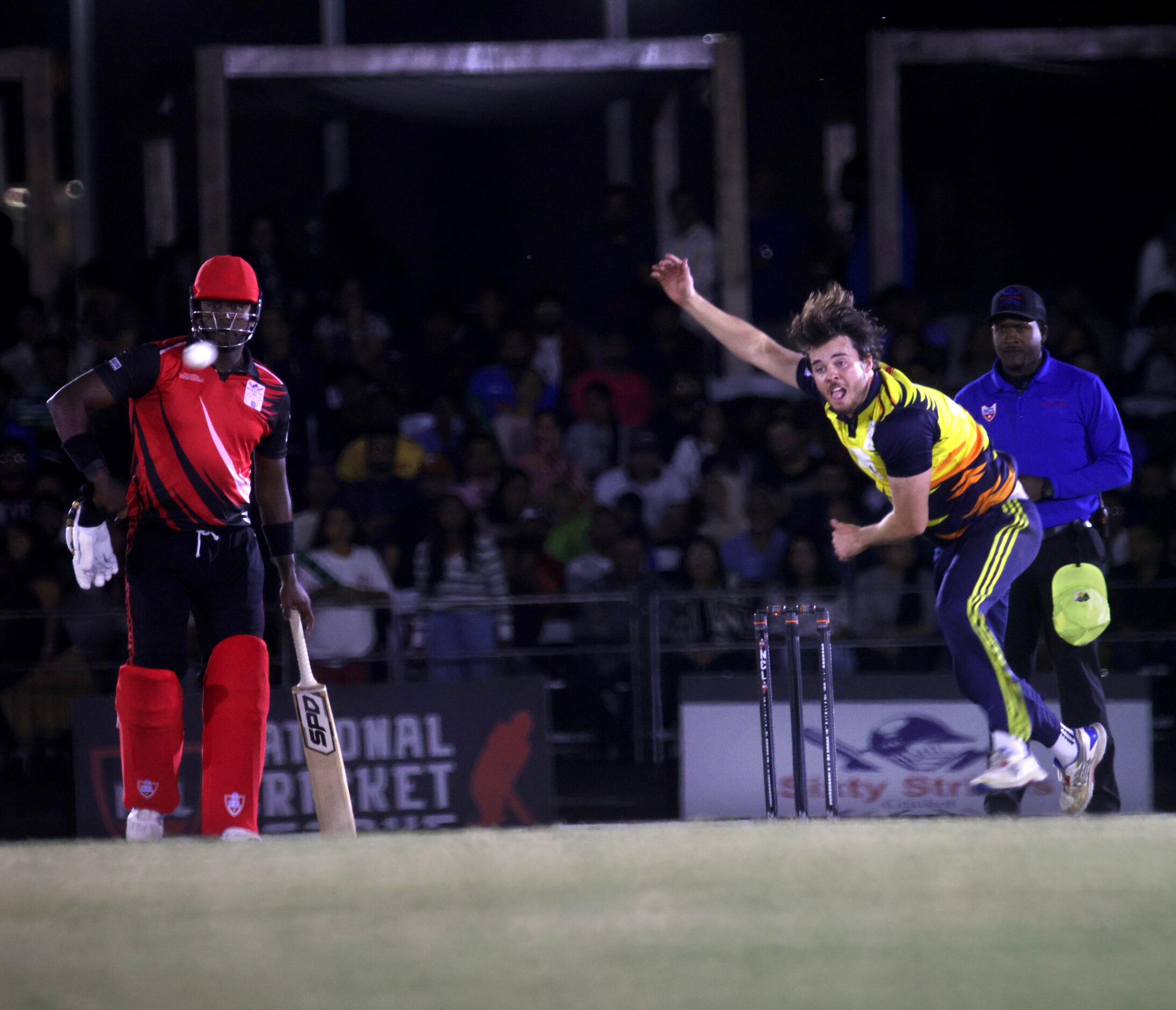 Chicago player #6 Ian Souness throws the ball as The Chicago Cricket Club plays against the...