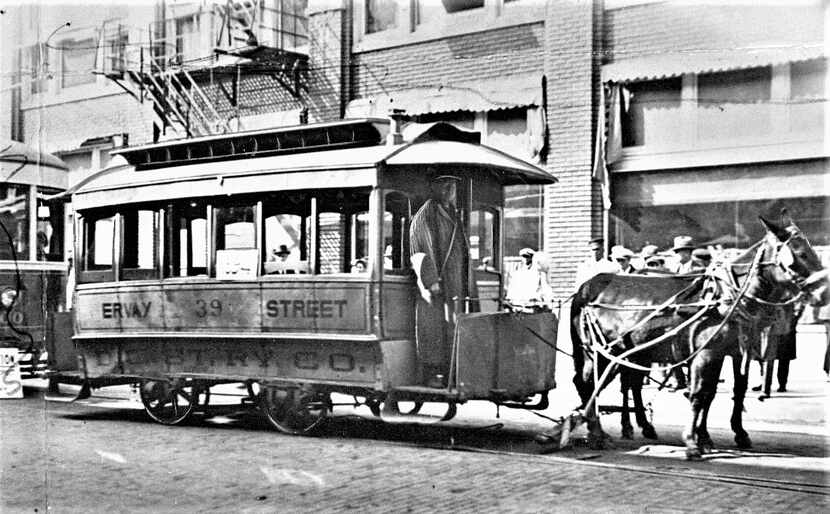 Mule-drawn streetcars, like this one on Ervay Street, were once a common sight around...