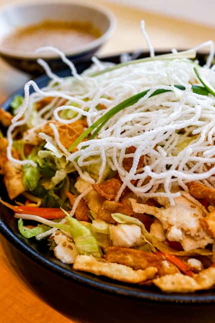 Chinese chicken salad is one of the menu items owner Mark Carey is excited about at Cafe...