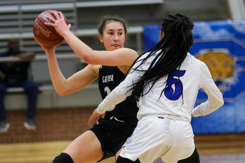 Denton Guyer's point guard Isabella Earle (3) prepares to throw past Mansfield Summit's...