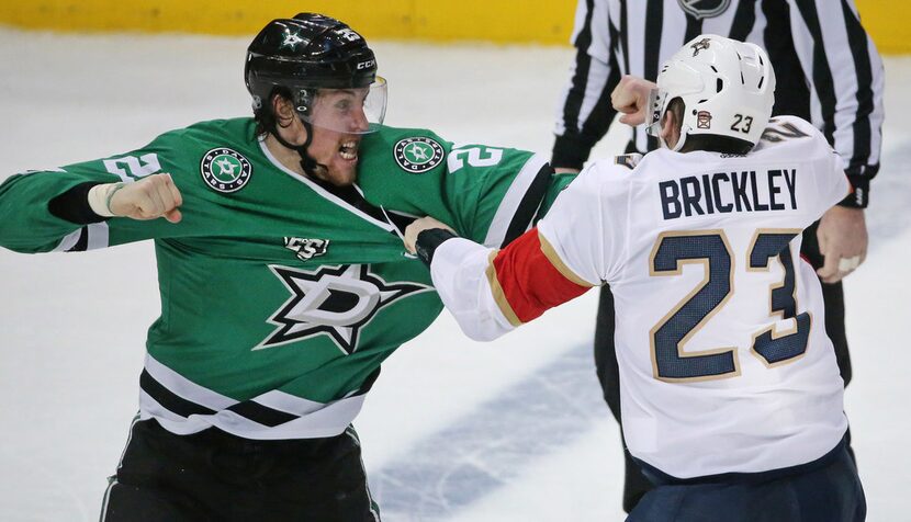 Dallas Stars right wing Brett Ritchie (25) fights with Florida Panthers center Connor...