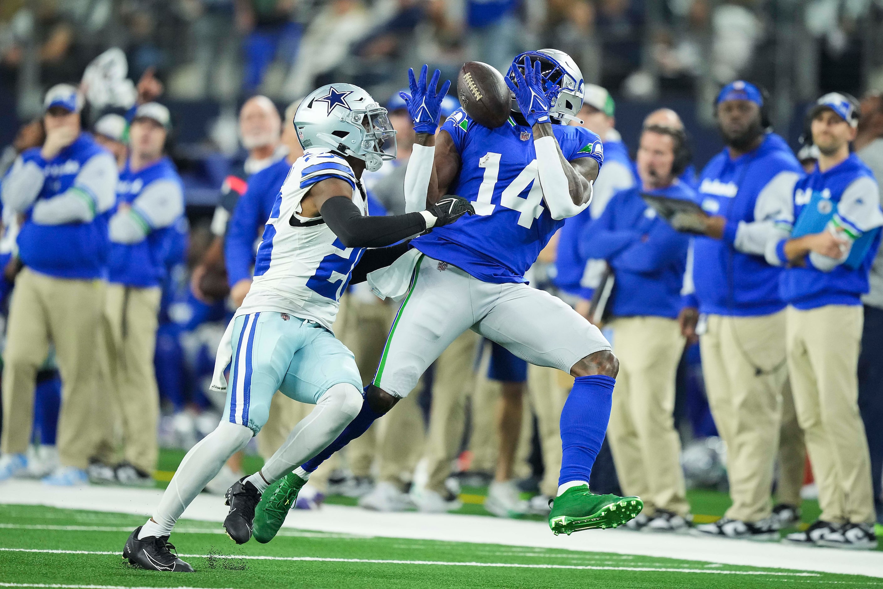 Seattle Seahawks wide receiver DK Metcalf (14) catches a pass as Dallas Cowboys cornerback...