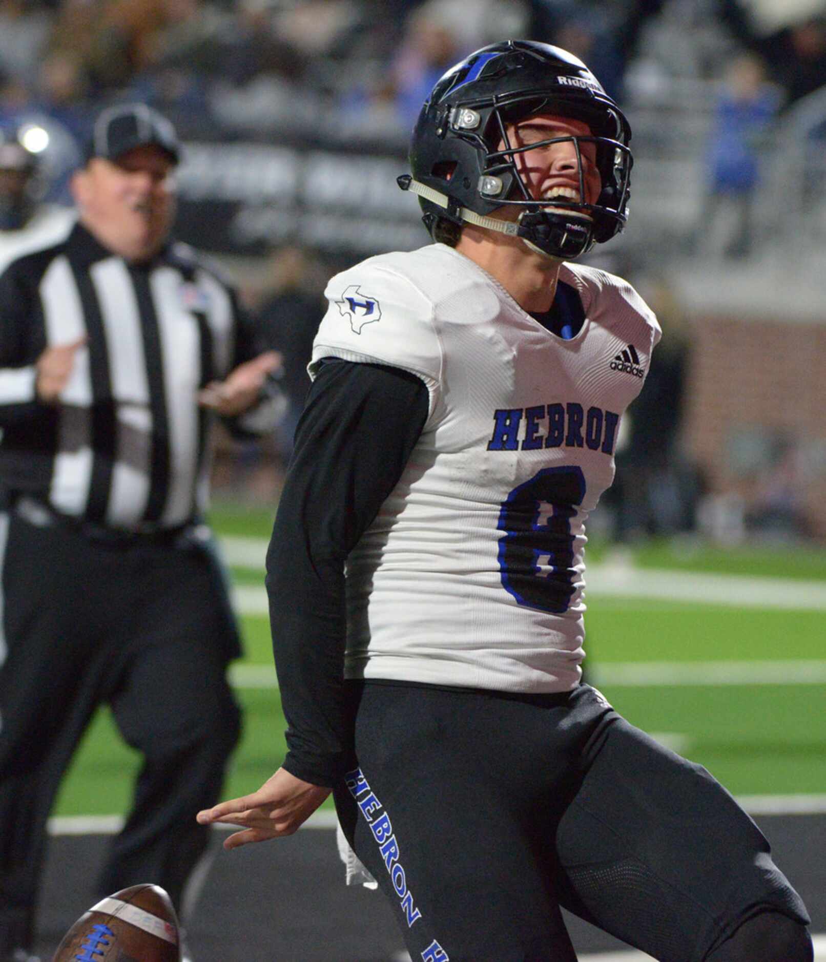 Hebron's (8) Carson Harris celebrate after a touchdown in the first half of a Class 6A...
