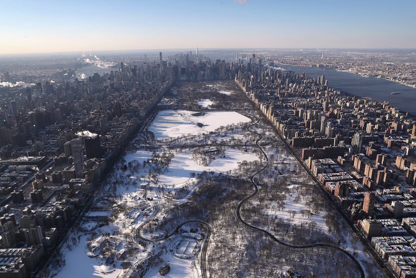 Central Park, the iconic oasis in central Manhattan, takes on magical qualities in the snow. 