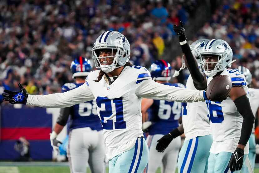 Dallas Cowboys cornerback Stephon Gilmore (21) celebrates after intercepting a pass by New...