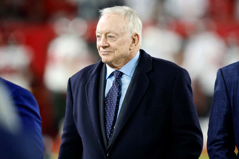 Dallas Cowboys owner Jerry Jones watches as his team prepares to face the Tampa Bay...