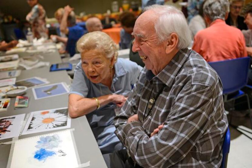 
Bill Campbell and volunteer Gerry Trizza laugh during a recent session of Casa de Vida. 
