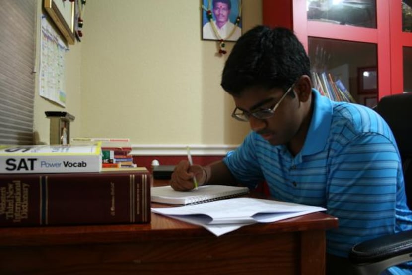 
Lokesh Nagineni makes a list of words in preparation for the Scripps National Spelling Bee. 
