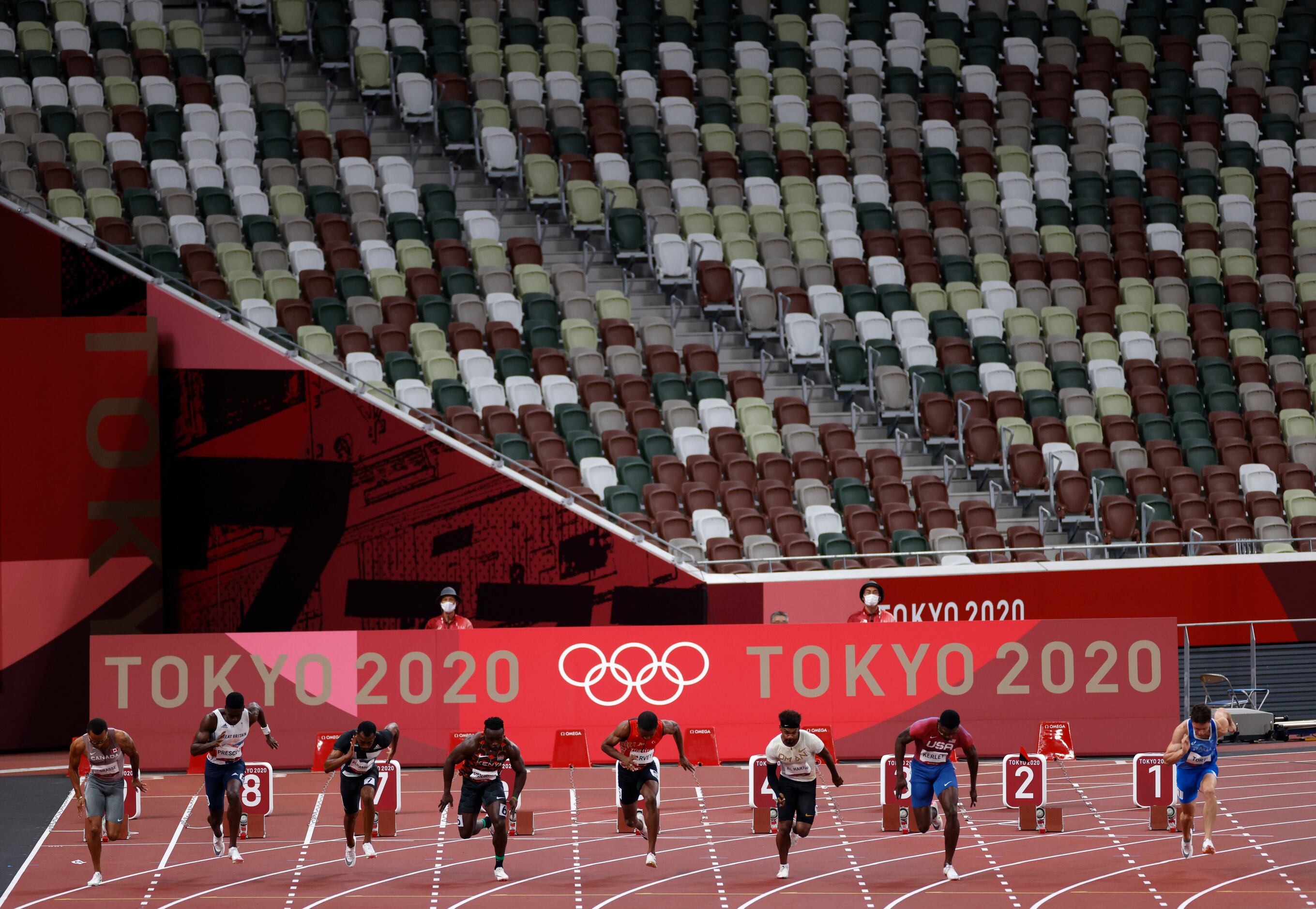 USA’s Fred Kerley (lane 3) and others from heat 5 of 7 race in the 100 meter qualifying race...