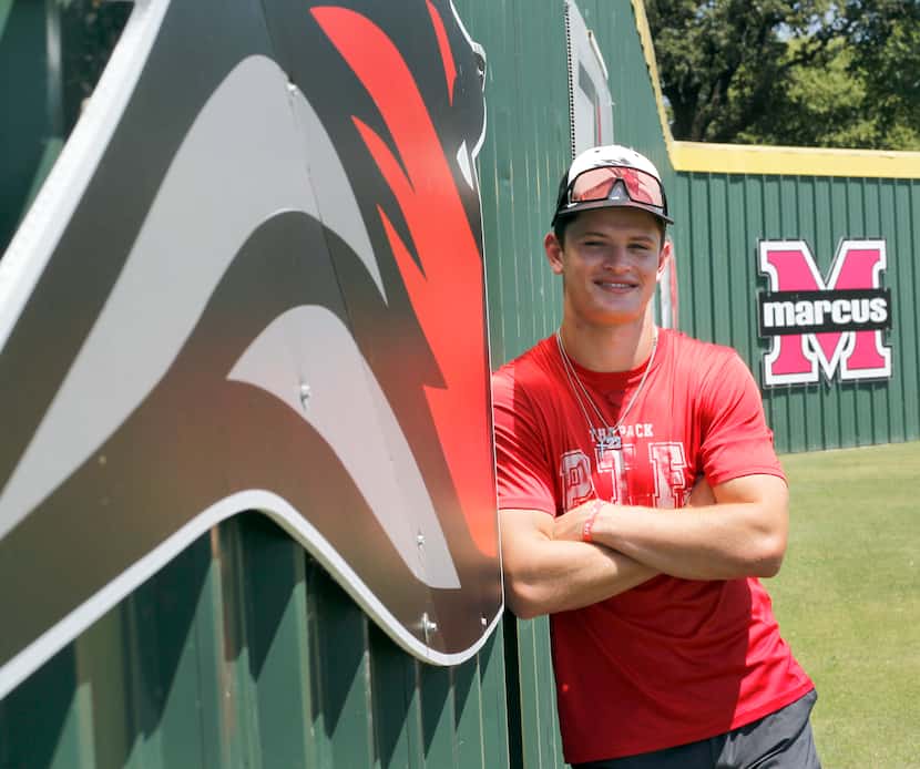 Flower Mound Marcus outfielder Caden Sorrell poses at the center field wall of the Marcus...