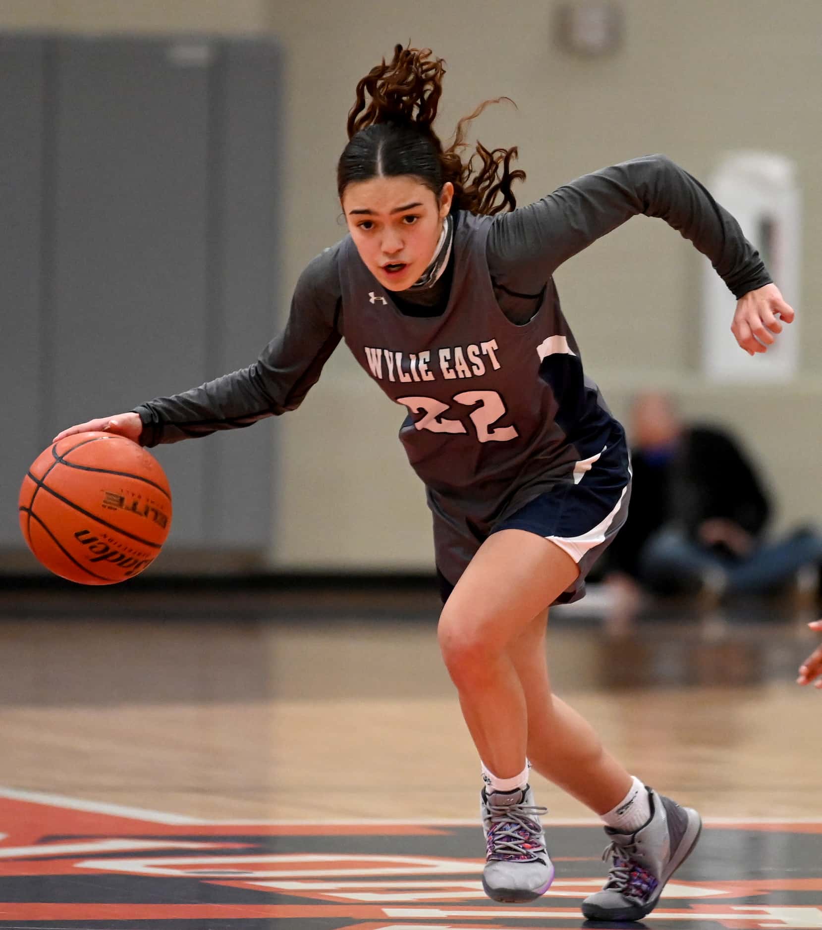 Wylie East’s Aaliyah Halstied (22) dribbles in the second half during a girls basketball...