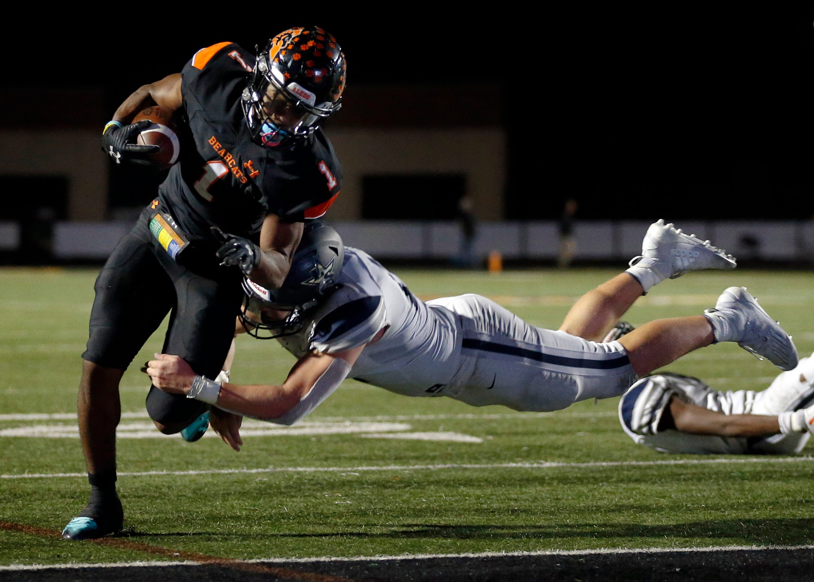 Frisco Lone Star linebacker Blake Gotcher (12) makes a diving tackle attempt of Aledo...