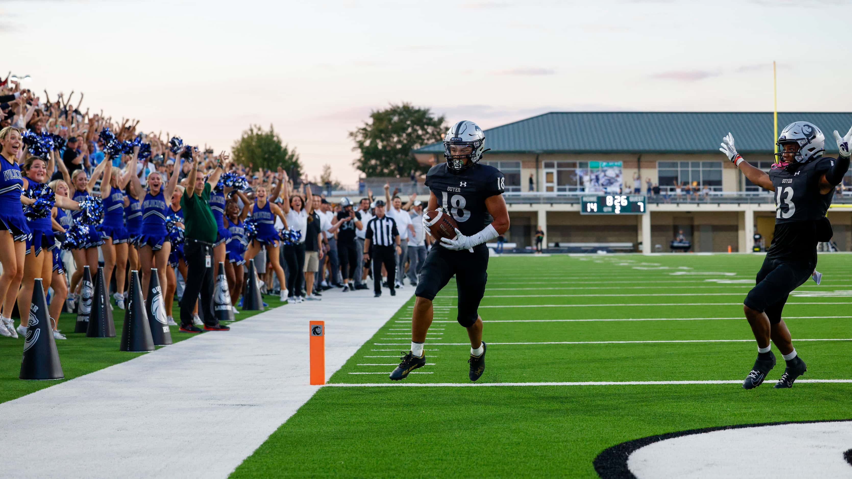 Denton Guyer defensive back Eli Bowen (18) crosses the goal line for a touchdown after...