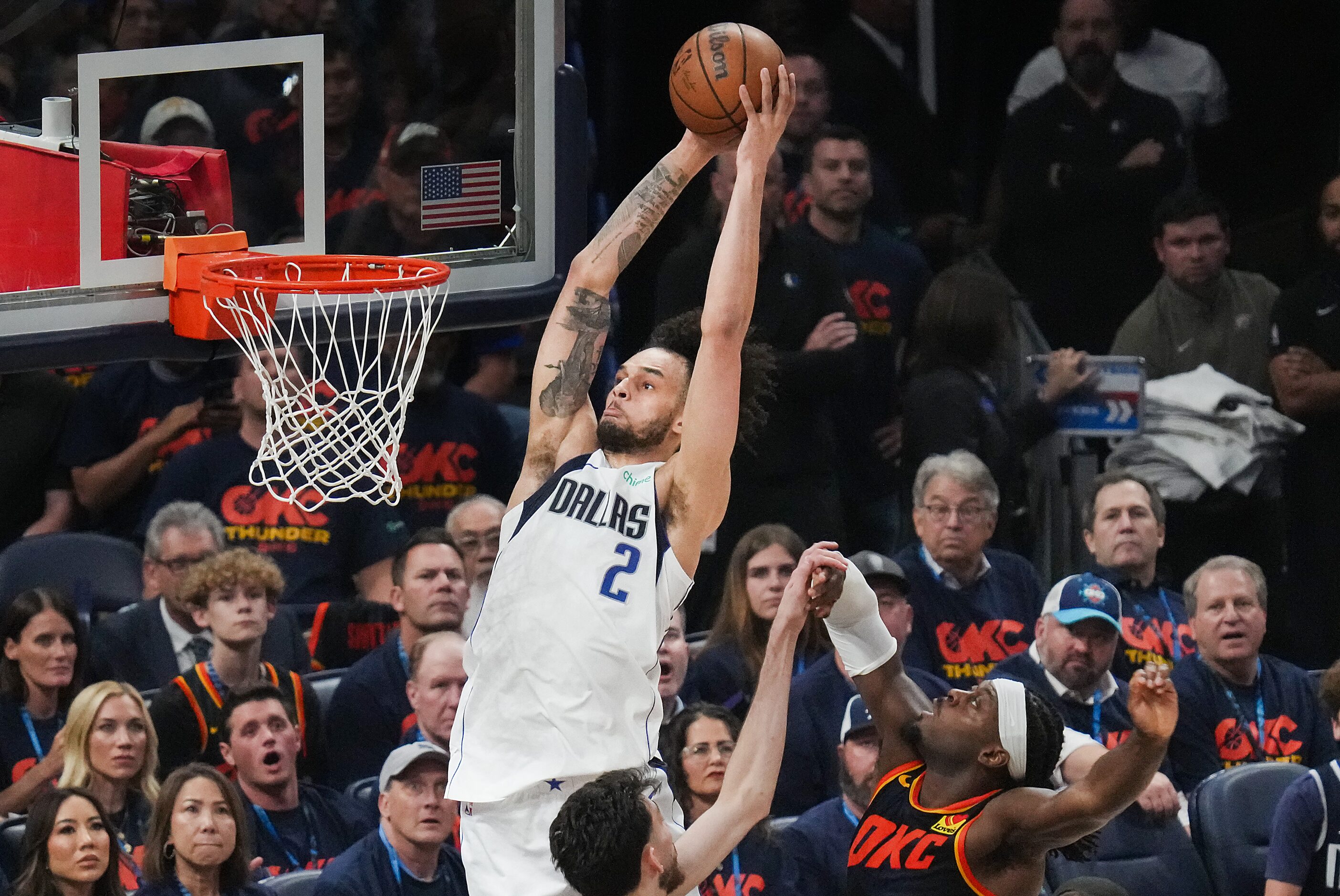 Dallas Mavericks center Dereck Lively II (2) dunks the ball past Oklahoma City Thunder guard...