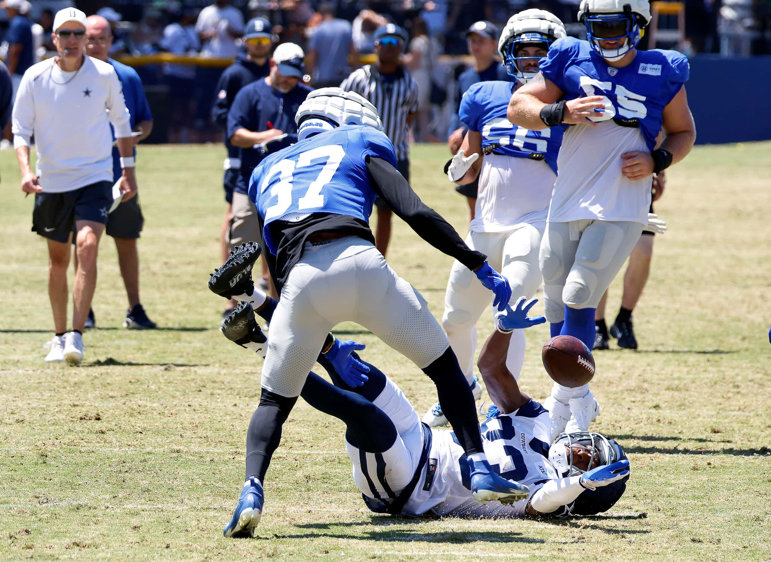 Dallas Cowboys wide receiver Jalen Brooks (83) tries to gather a bobbled pass as he was hit...