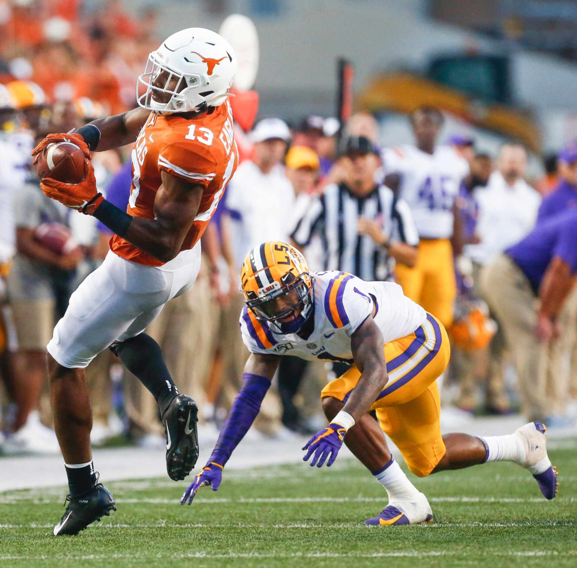 Texas Longhorns wide receiver Brennan Eagles (13) receives a pass over LSU Tigers cornerback...