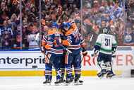 Vancouver Canucks goalie Arturs Silovs (31) looks away as Edmonton Oilers celebrate a goal...