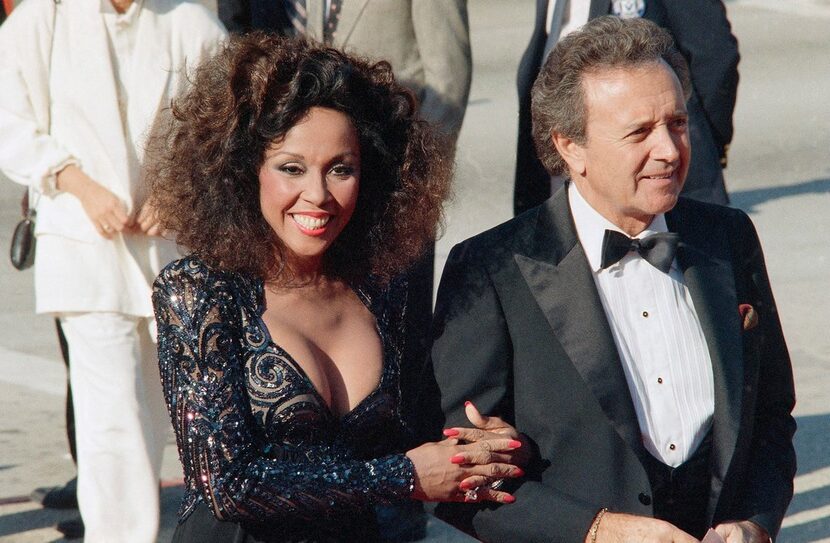 FILE - This Sept. 21, 1986 file photo shows singers Vic Damone, right, and Diahann Carroll...