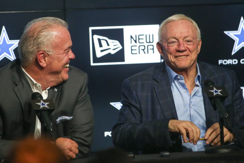 Dallas Cowboys executive vice president Stephen Jones, left, and owner Jerry Jones joke...