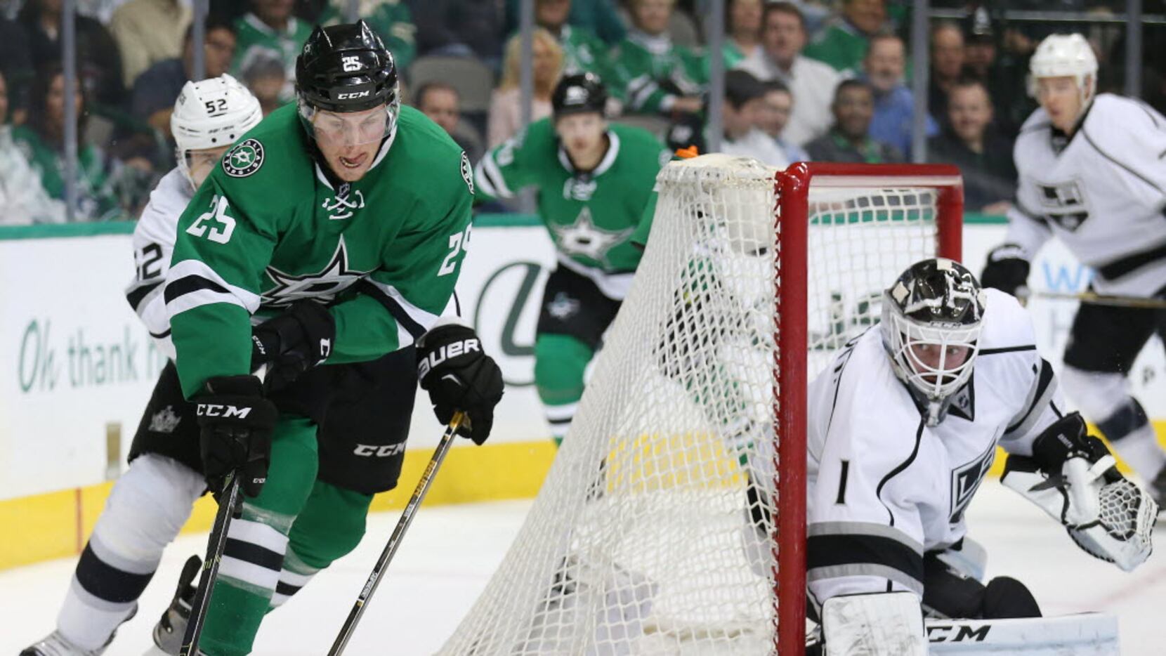 Dallas Stars right wing Brett Ritchie (25) attempts to move the puck near the net while...