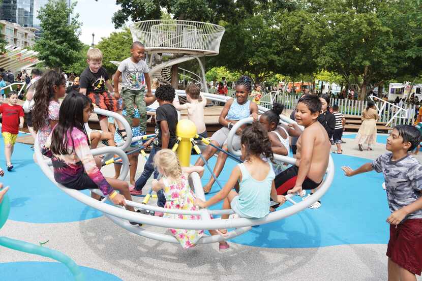Children play at Klyde Warren Park in Dallas, Texas