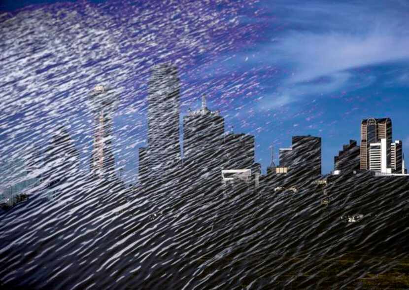 A double-exposure image shows the Dallas skyline framed in the Trinity River, an untapped...
