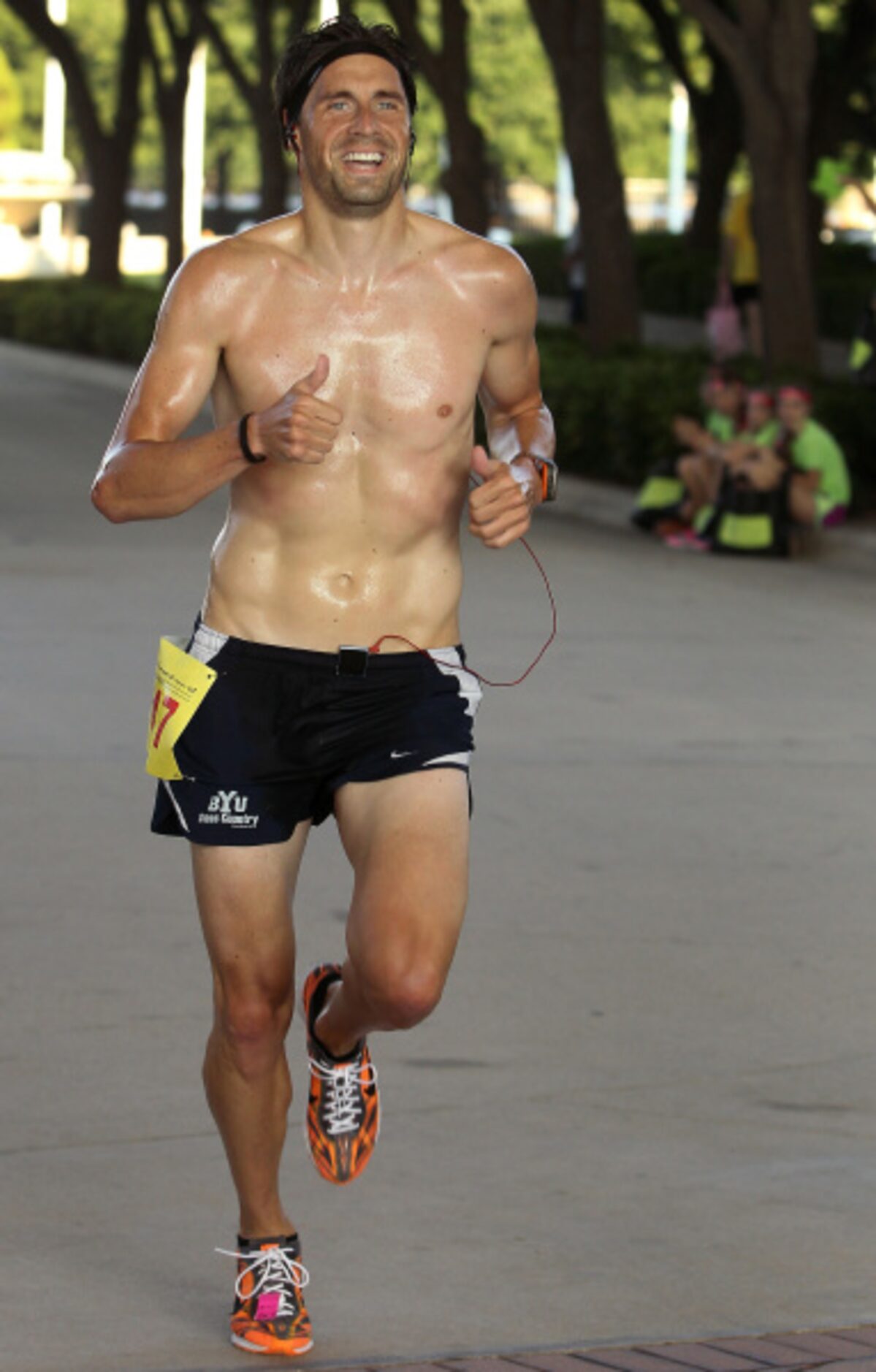 Keith Jensen of Dallas finishes first in the mens competitive 5K at 18:04 in the 22nd annual...