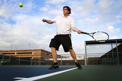 FILE PHOTO: Michael Fowler prepares to send a ball back to his good friend Tylir Jimenez,...