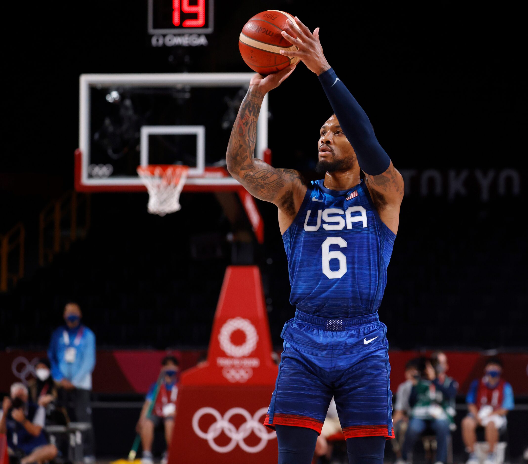 USA’s Damian Lillard (6) attempts a shot in a game against Spain during the first half of a...