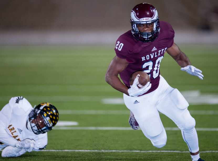 Rowlett wide receiver LaDarius Dickens (20) had 11 catches for 133 yards and a touchdown...