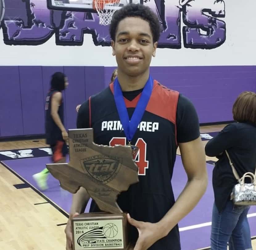 P.J. Washington poses with his trophy after winning the Texas Christian Athletic League...