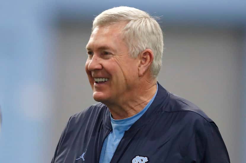 FILE - In this March 3, 2019 file photo, North Carolina coach Mack Brown smiles during the...