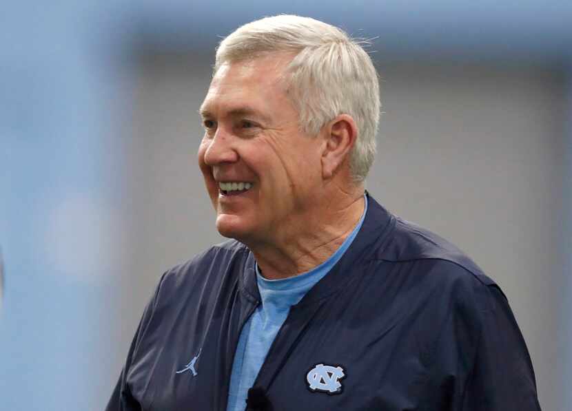 FILE - In this March 3, 2019 file photo, North Carolina coach Mack Brown smiles during the...